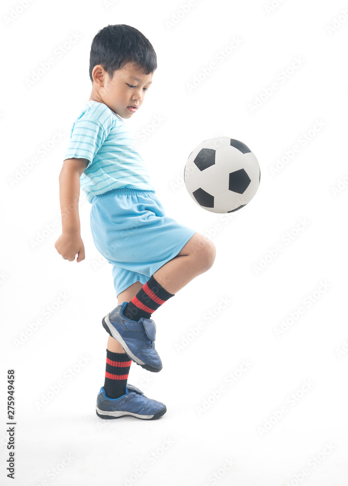 Asian boy playing football isolated, healthy and strong kid