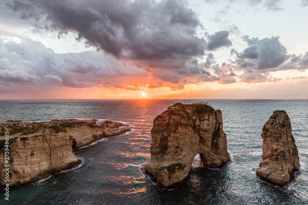 Sunset at the Raouche Rocks in Beirut Lebanon Sunset at the Raouche Rocks in Beirut Lebanon