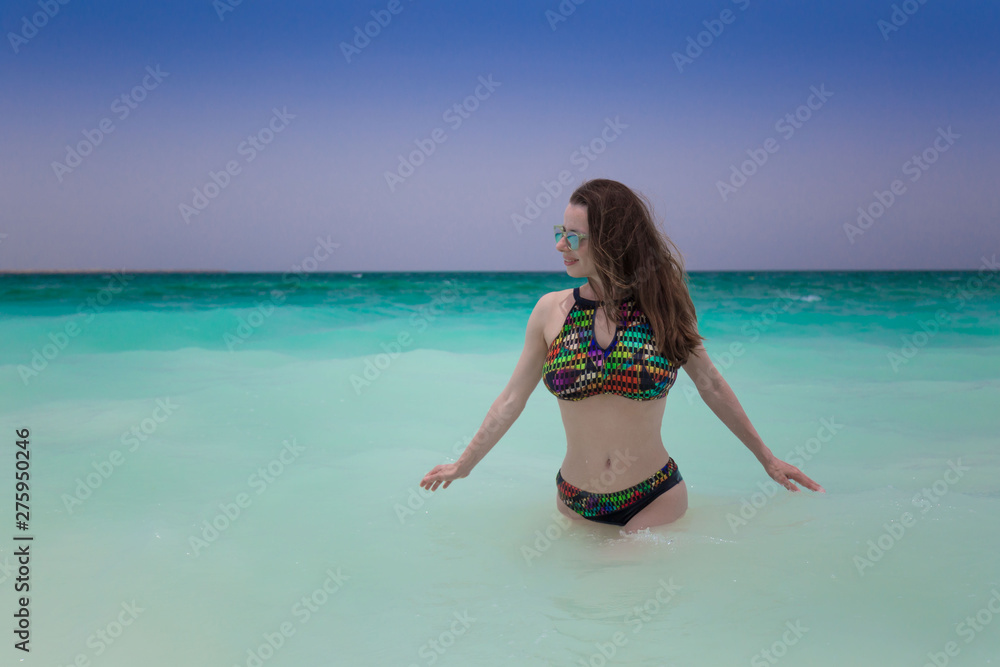 Woman sand beach, bikini, sunglasses, Maldives Woman sand beach, bikini, sunglasses, Maldives