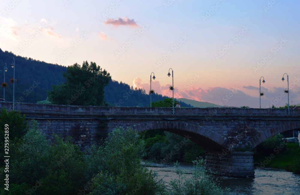 Fototapeta premium old stone bridge in the evening