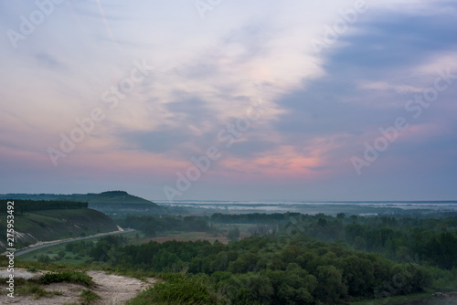 dawn on river. fog on the river. pink dawn sky © Taranova_ksenya