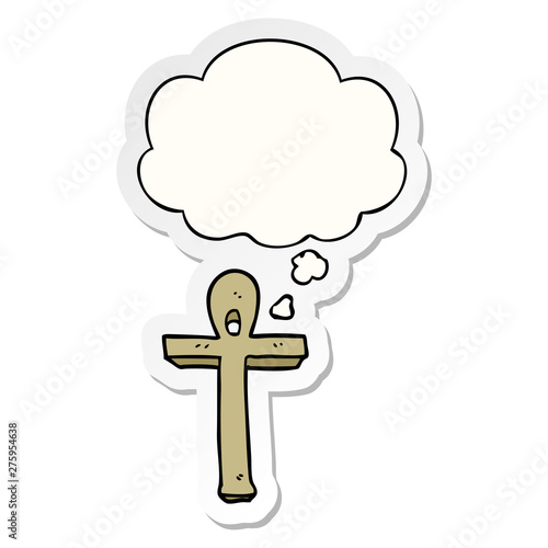 cartoon ankh symbol and thought bubble as a printed sticker