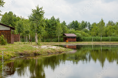 Holiday house near the lake. The concept of fishing and recreation