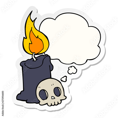 cartoon skull and candle and thought bubble as a printed sticker