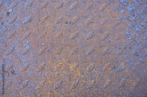 Natural relief metal texture with rust and scuffs. The lower part of the barbecue top view