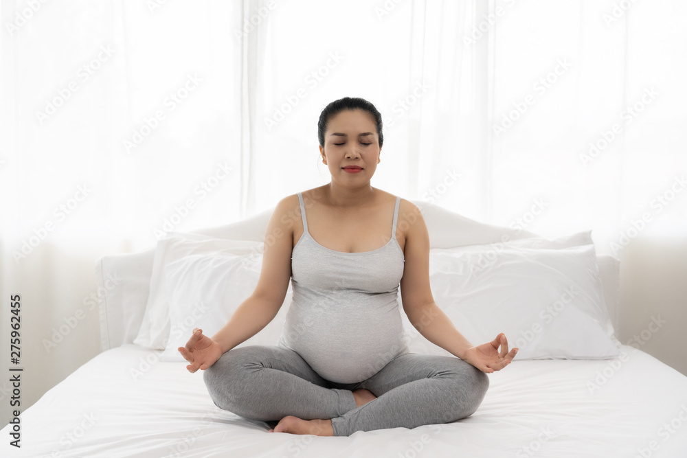 Pregnant women are doing yoga and meditation. Pregnant women are doing yoga and meditation.