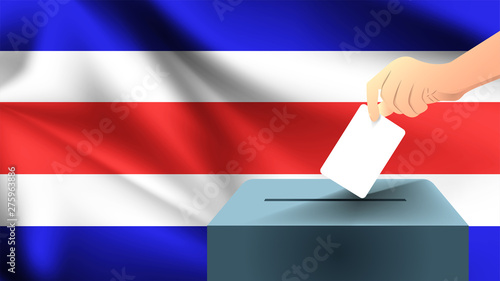 Male hand puts down a white sheet of paper with a mark as a symbol of a ballot paper against the background of the Costa Rica flag, Costa Rica the symbol of elections