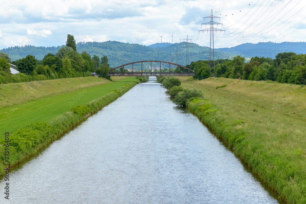 Peaceful canal or river in green countryside Peaceful canal or river in green countryside