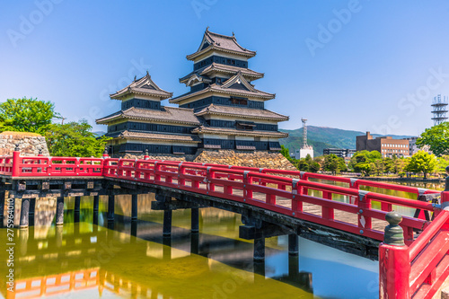 Matsumoto - May 25  2019  The castle of Matsumoto and the red bridge leading to it  Japan