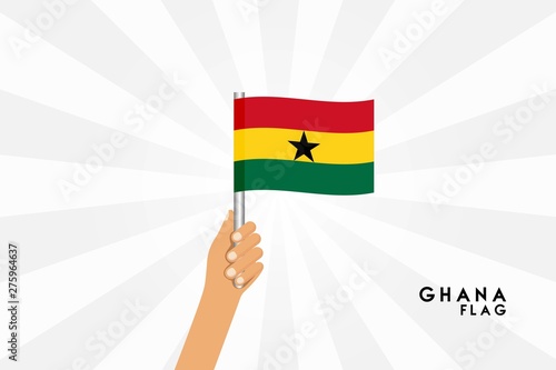 Vector cartoon illustration of human hands hold Ghana flag. Isolated object on white background.