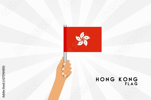 Vector cartoon illustration of human hands hold Hong Kong flag. Isolated object on white background. © stocktr