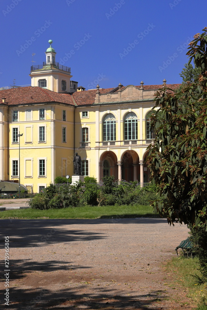 palazzo storico giallo a milano in italia, yellow historical building in milan city in italy 