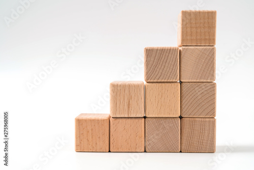 wood cube arrange in pyramid shape  business concept