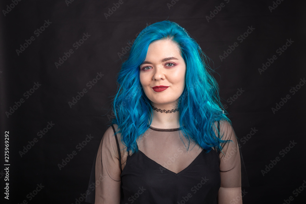 people, fashion and hair concept - close-up portrait of young woman in black dress with blue hair on black background people, fashion and hair concept - close-up portrait of young woman in black dress with blue hair on black background