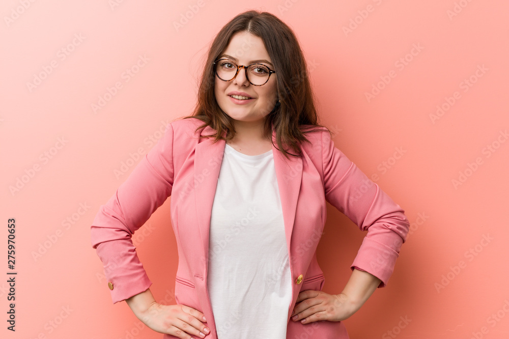 Young plus size business caucasian woman confident keeping hands on him hips. Young plus size business caucasian woman confident keeping hands on him hips.