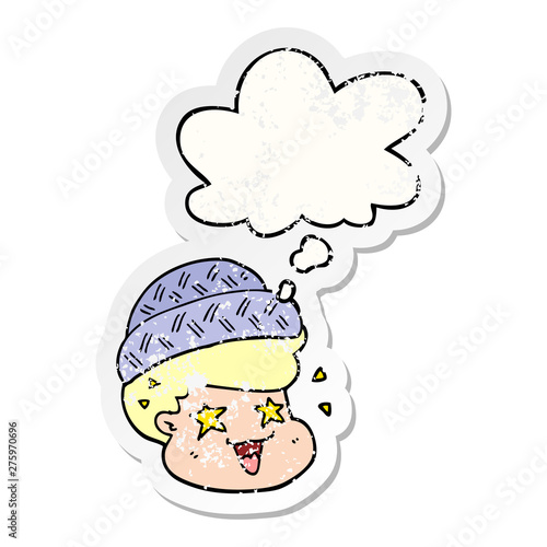 cartoon boy wearing hat and thought bubble as a distressed worn sticker