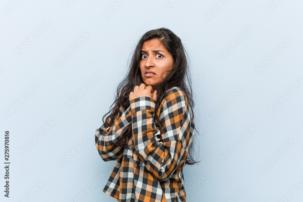 Young cool indian woman scared and afraid. Young cool indian woman scared and afraid.