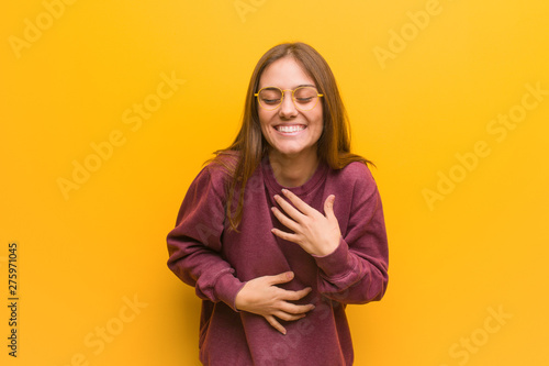 Young casual woman laughing and having fun © Asier