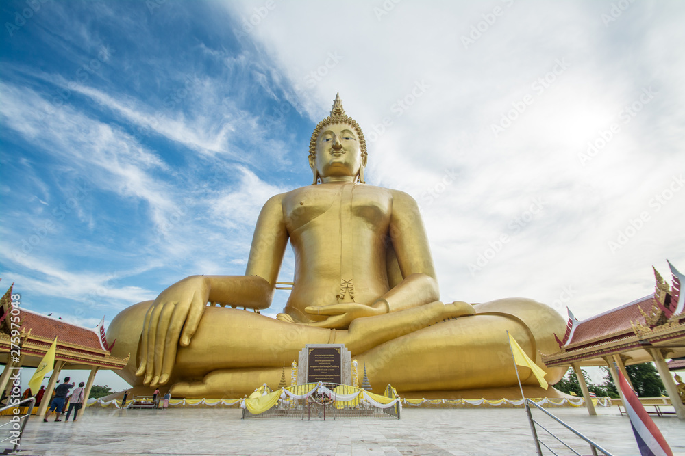 Big golden sitting Buddha at Wat Muang temple in Thailand Big golden sitting Buddha at Wat Muang temple in Thailand