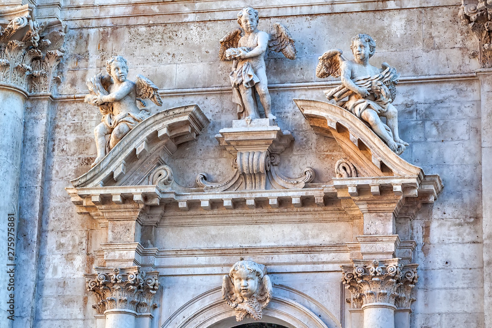Bas-relief with three angels. Dubrovnik, Croatia Bas-relief with three angels. Dubrovnik, Croatia