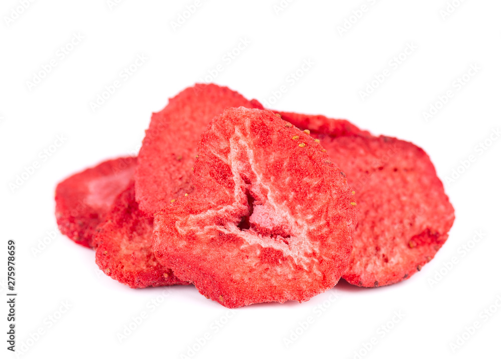 Obraz premium Dried strawberry slices isolated on white background. Dehydrated strawberries chips.