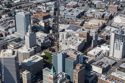 Aerial view of downtown buildings and streets in Oakland California.
