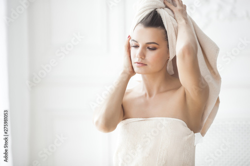 Young attractive woman after bathing