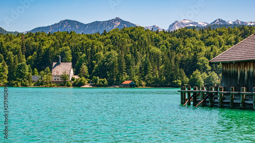 Beautiful alpine view with a boat hut at the famous Walchensee - Bavaria - Germany