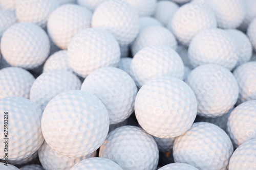 Golf balls group heap closeup