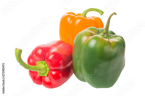 Pile of colorful bell peppers yellow, red and green paprika isolated on white background.
