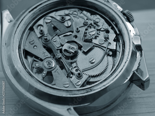 close up macro pic of vintage chronograph watch mechanism
