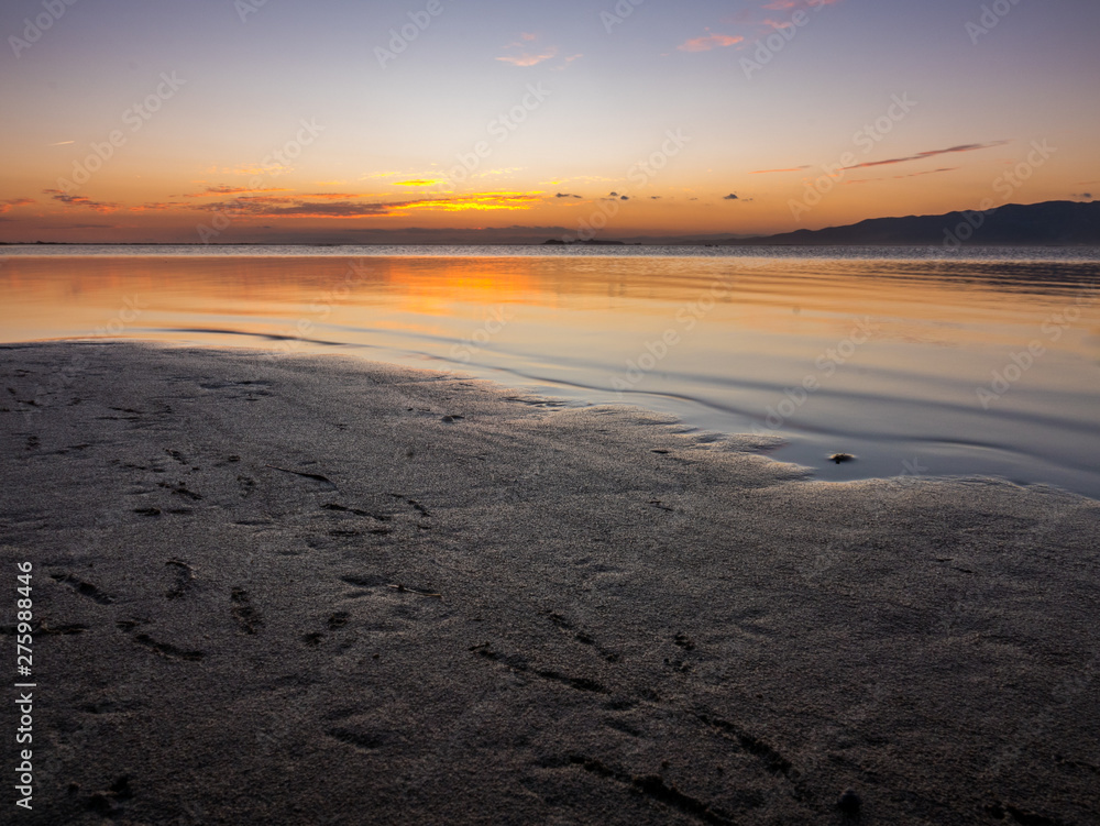 Sunset on the beach of Trabucador (Costa Dorada, Tarragona, Spain )