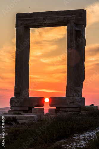 Sunset at the Portara in Naxos, Aegean in Greece