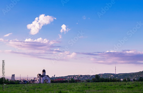 Fototapeta Naklejka Na Ścianę i Meble -  view of a church and communication tower on Kok Tobe hill, Almaty Kazakhstan.
