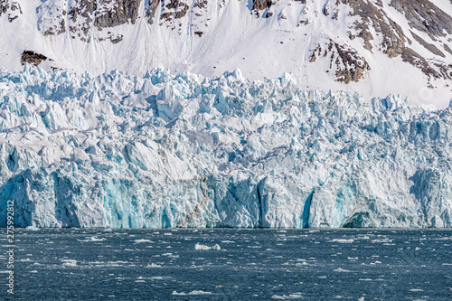 Blue glacier in Kongsfjorden fjord in Svalbard photo