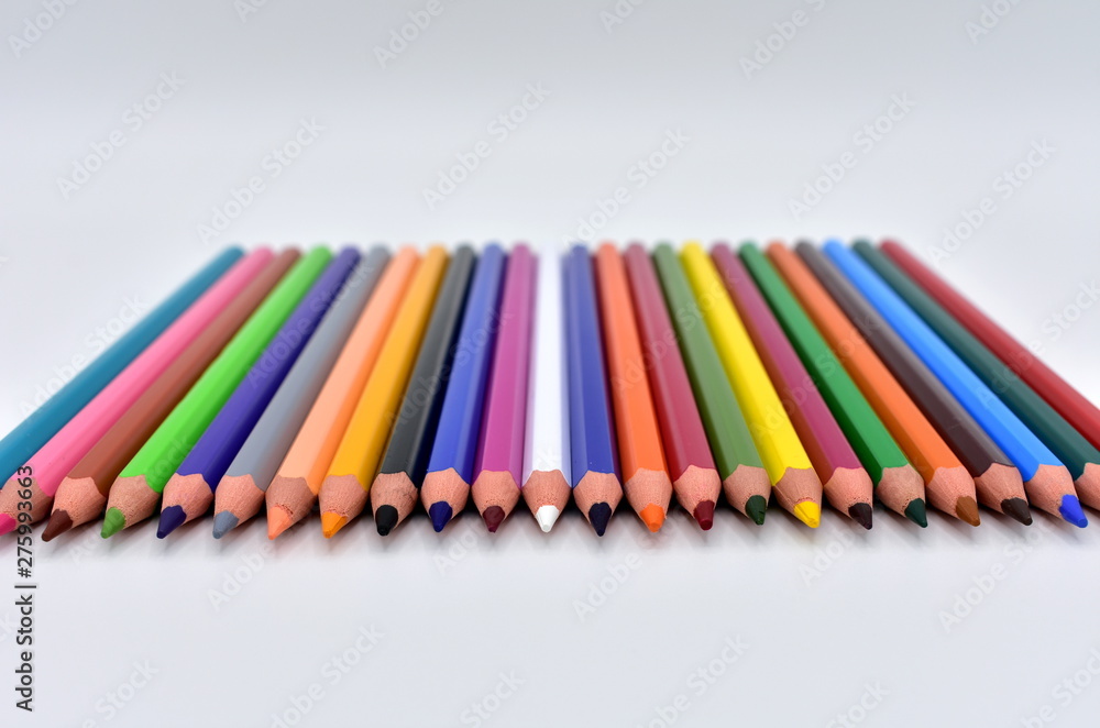 Wooden pencils with colours on a white background. Wooden pencils with colours on a white background.