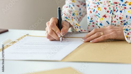 Businesswoman signing contract