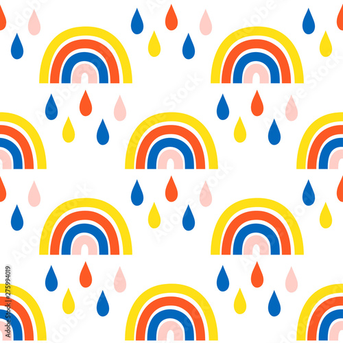 Seamless pattern with cute rainbows and raindrops