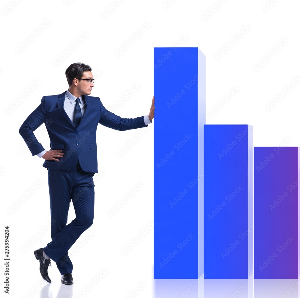 Businessman standing next to bar chart on white background Businessman standing next to bar chart on white background