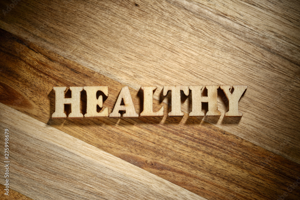 Word healthy made with wooden letters Word healthy made with wooden letters