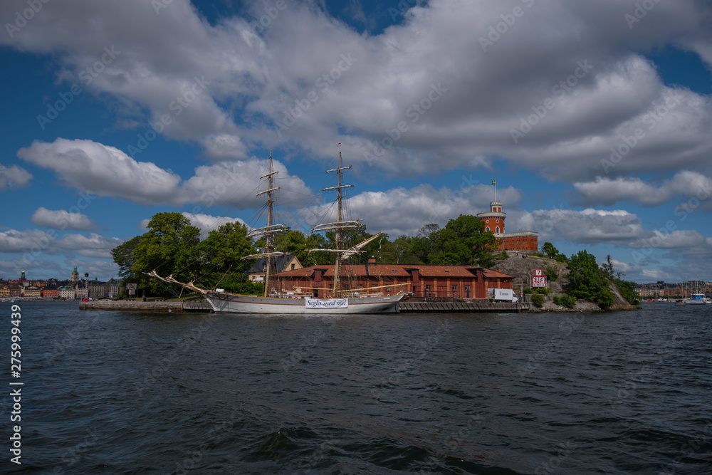 Fototapeta premium Houses and landscape at the inner harbor of Stockholm a summer day.