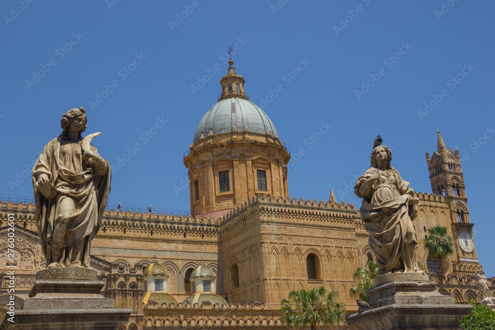 Wide view of the historical beautiful cathedral of Palermo Sicily, religious statues, Unesco medieval architecture and old dome