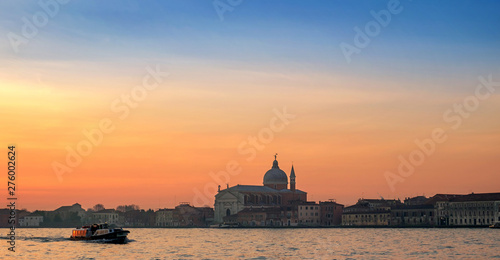 Fototapeta Naklejka Na Ścianę i Meble -  Boat crossing Venice lagoon