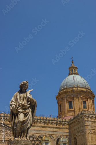 Vertical view of a detail at the cathedral of Palermo Sicily  detail of the historical dome and statue