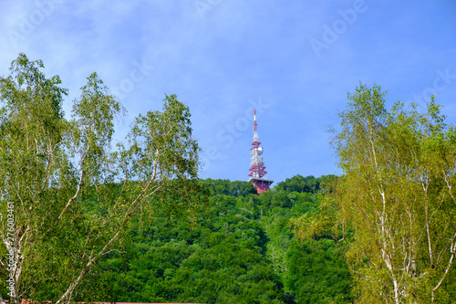 Communications and broadcast tower on top of mountain photo