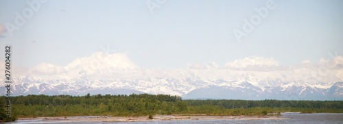 View of Mount Denali taken from the Train on the way to Denali National Park in Alaska.  