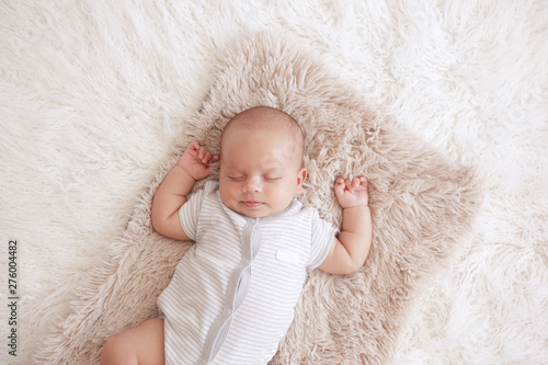 newborn boy is sleeping