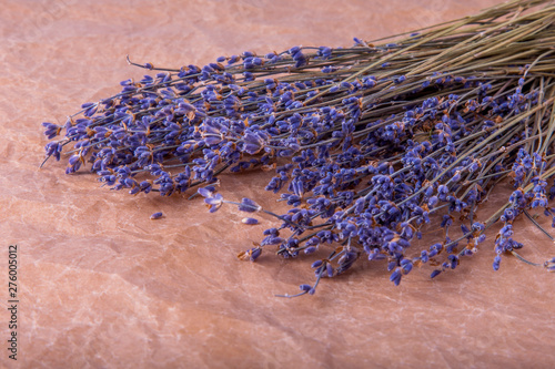 The dried-up lavender flowers on a table