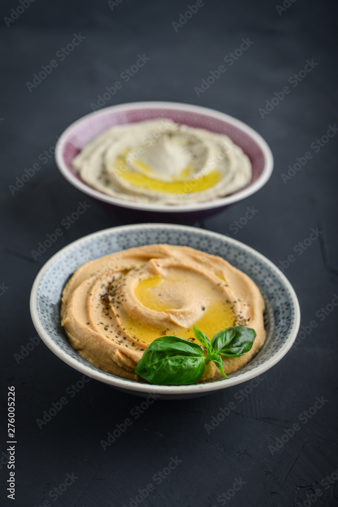 Bowls with different kinds hummus Bowls with different kinds hummus