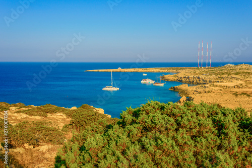  beautiful panoramic view of Cape Cavo Greco  filled with the gentle sunset sun